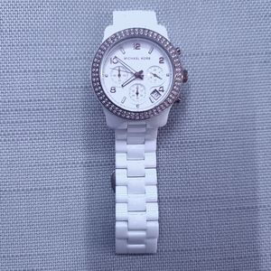 White Michael Kors watch with gold rim